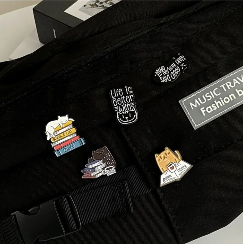 Women’s Jewelry Adorable Multicolored Cat Pins and some feature books and cups